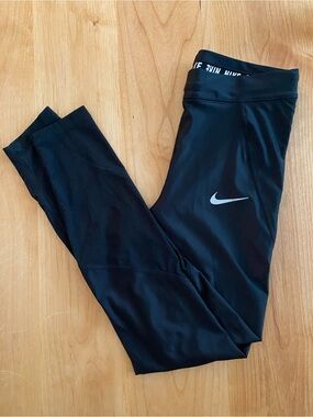 Nike Black Women's Active Running Leggings with Silver Swoosh mesh detail